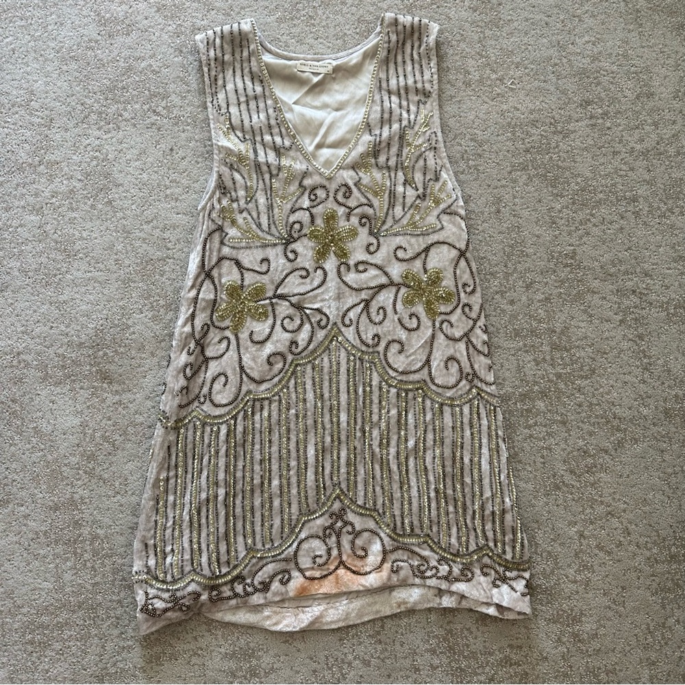 Elsa sequin dress. Stains and missing beads